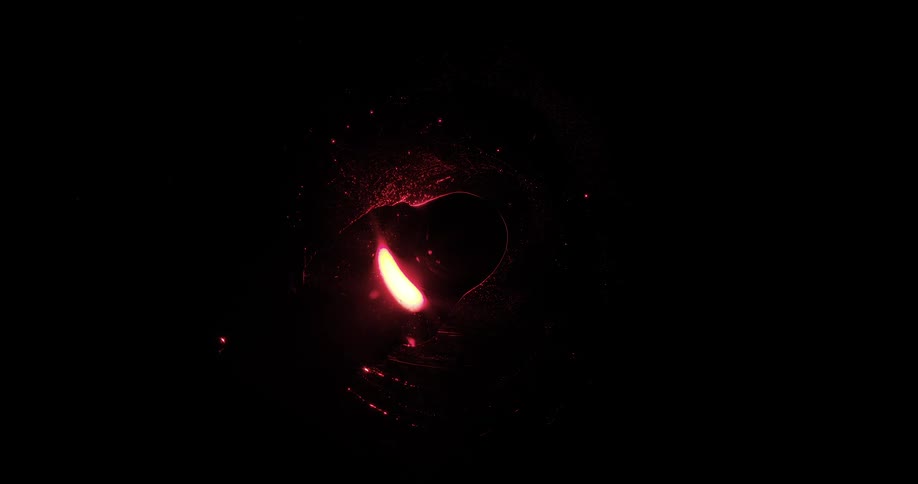 Dark fluid flows across glowing circular shape in tube obscuring both