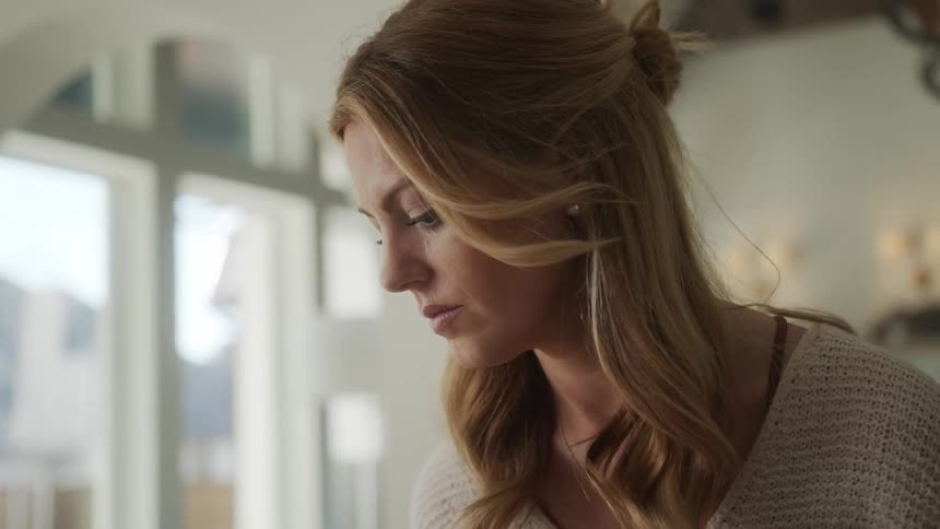 Portrait of a blonde woman indoors