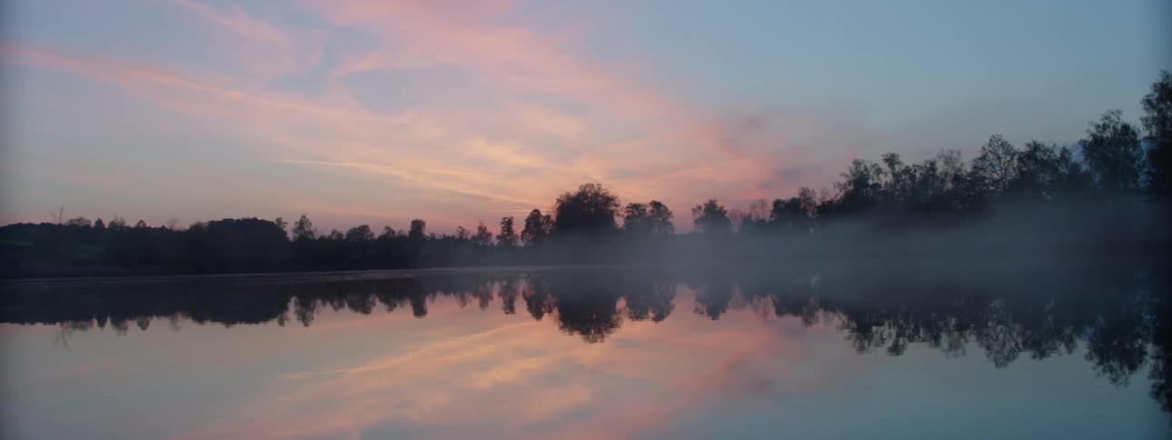 A light fog over a lake