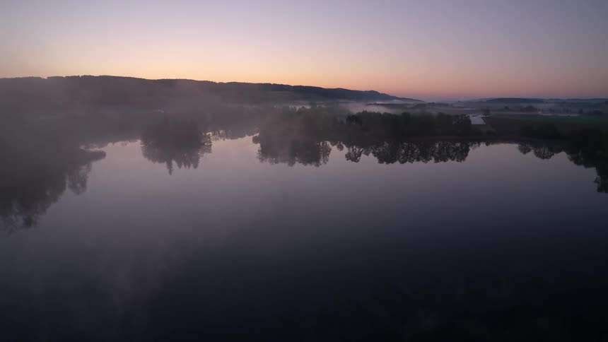 A light fog over a lake