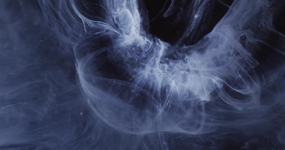 Abstract smoke swirling against a backdrop of a starry sky