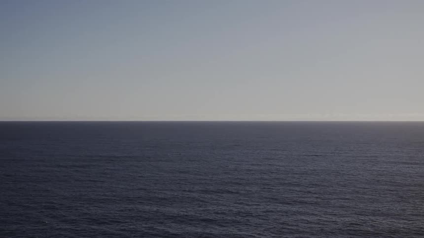 Small waves in the ocean on a light morning