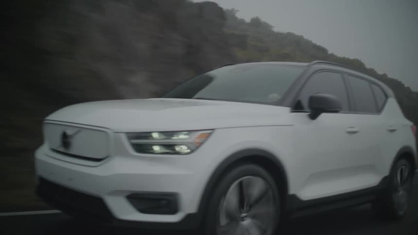 A car driving out on a foggy road