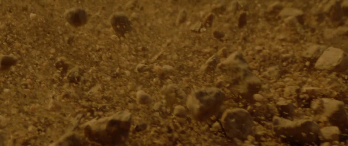 Dirt clods explode and shatter in a landslide