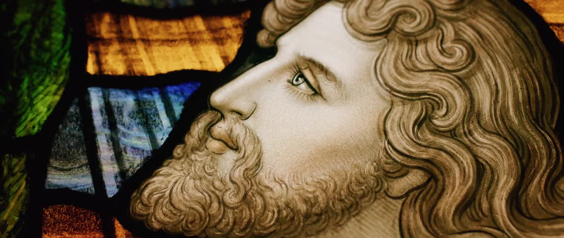 The painting is of a man looking up