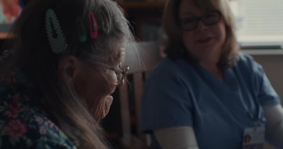 A nurse and a patient have a conversation