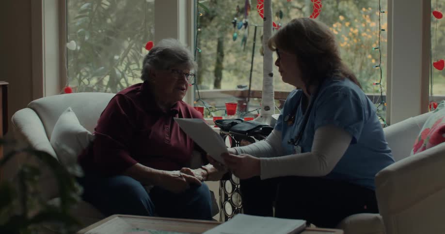 A clip of a old lady talking to her nurse