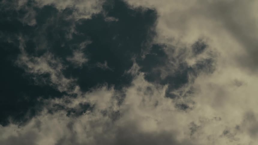 Clouds move across the sky