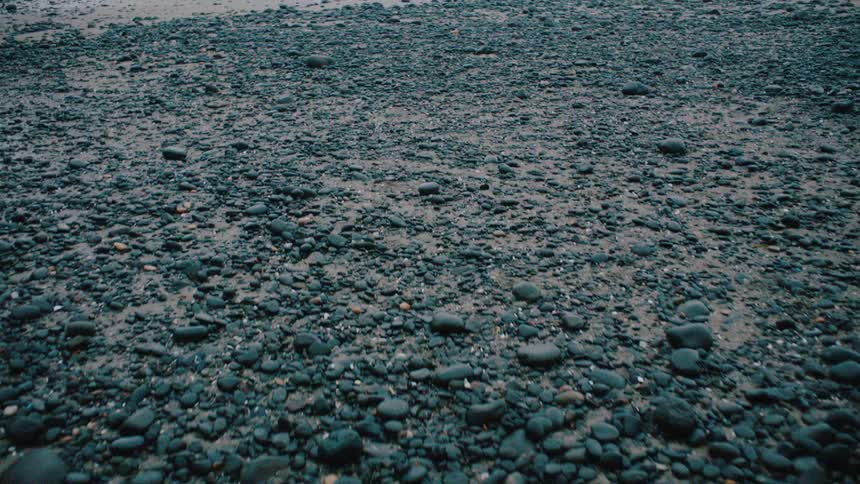 Water on the beach at midday
