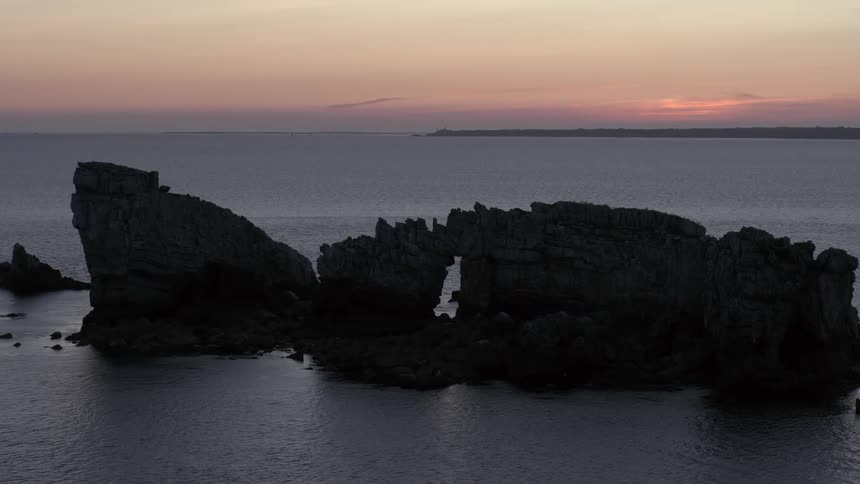A rock formation in the sea