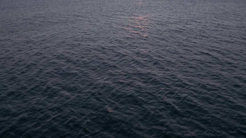 The sun shines on the ocean