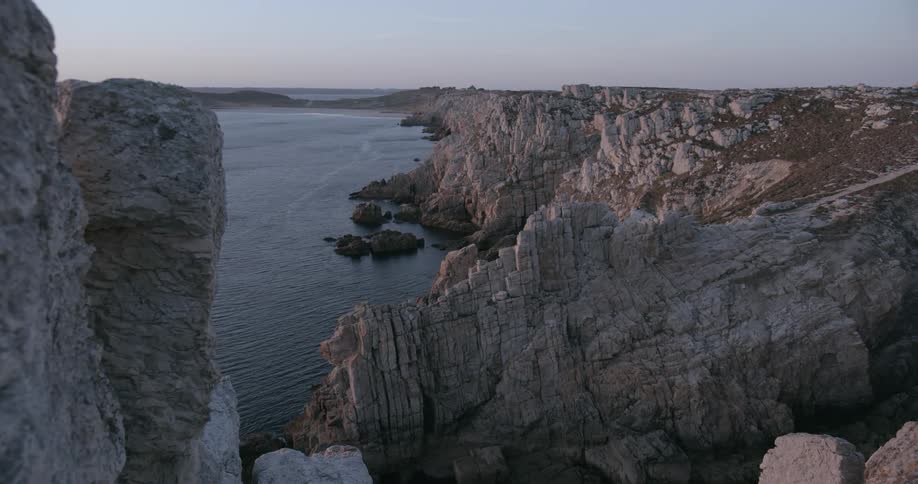 Landscape of mountains and rocky cliffs by the sea in a morning
