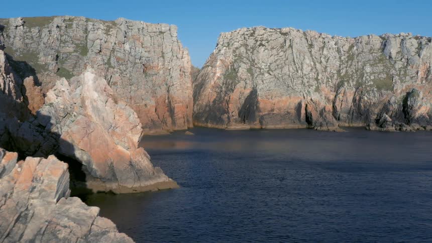 A group of rocky mountain islands in the sea