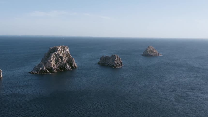 Several mountainous islands in an ocean