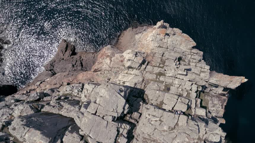 A large rock formation in the sea