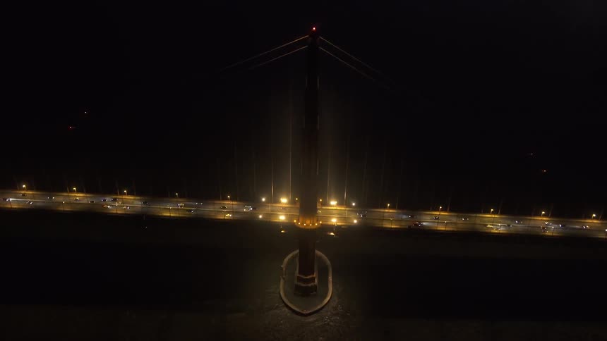 Aerial view of a bridge at night
