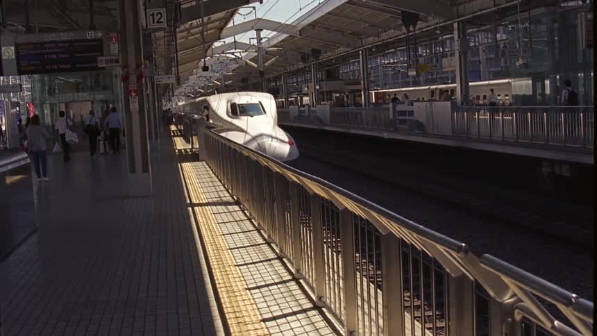 A train moves through a station