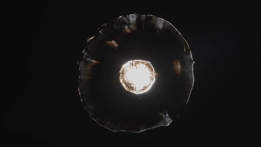 A computer effect that expands with a halo and then implodes on itself