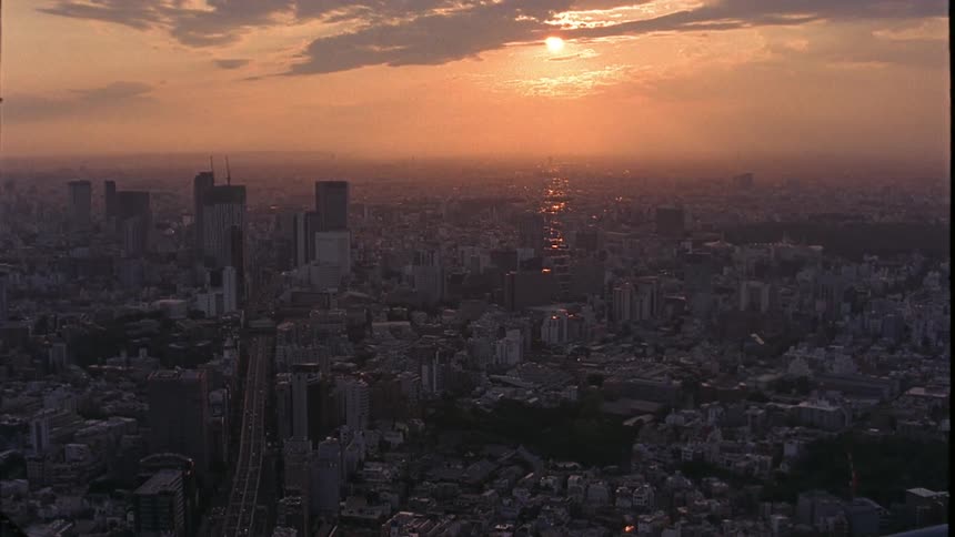 The sun shines on a huge city