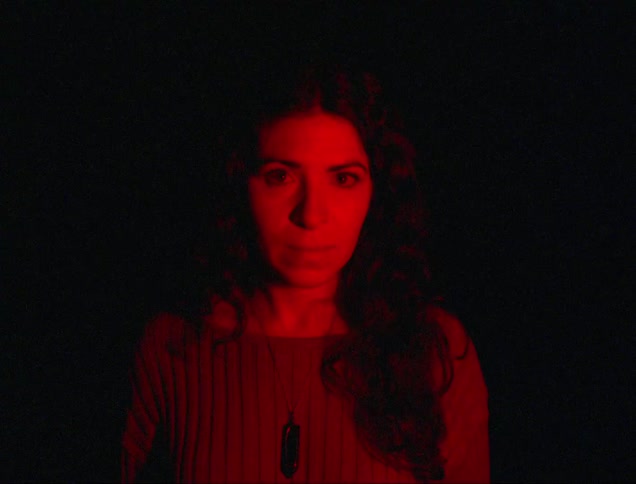 The light is flashing on the woman