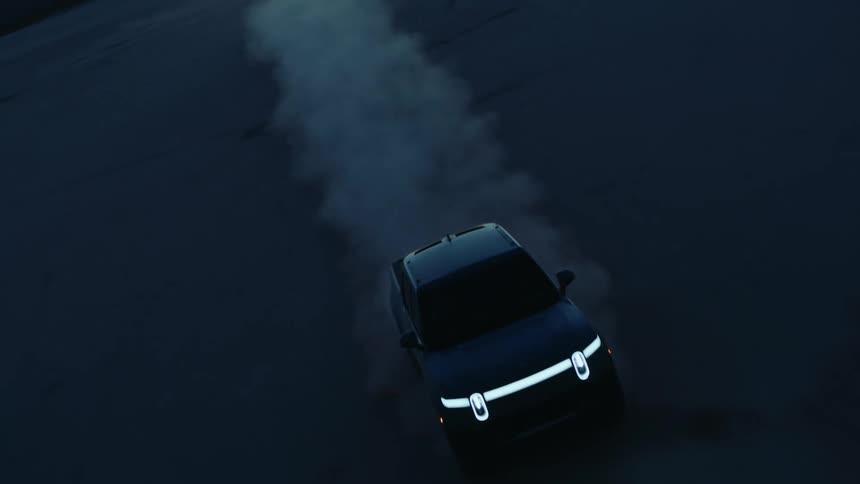 A night clip of a car moving in the desert