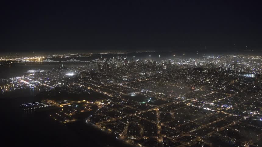Aerial view of a lit up city at night