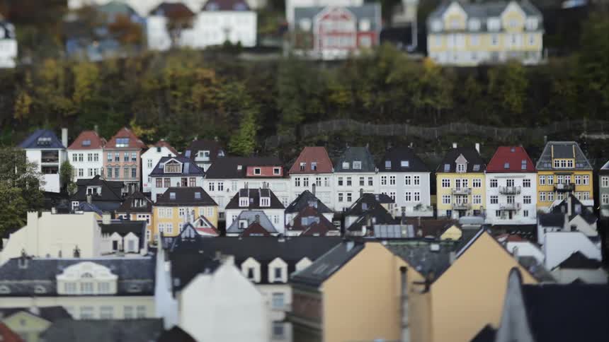 Panorama of residential houses of the same standard in a neighborhood with trees around