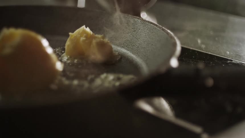 Butter melting in a cooking pan