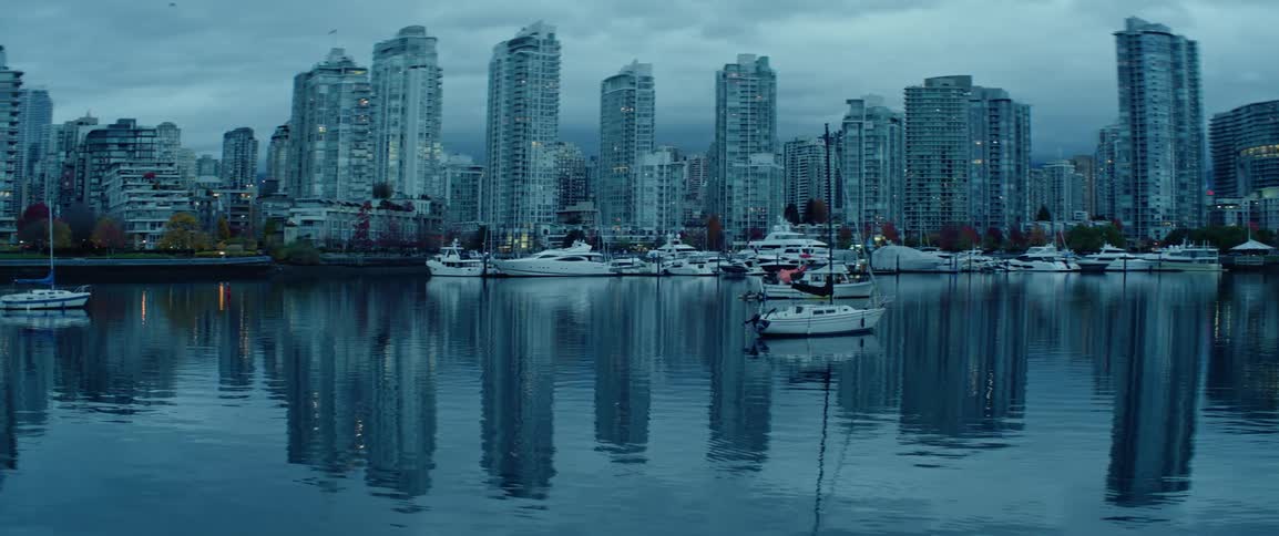 Vancouver's False Creek seen at dusk with various marinas and boats