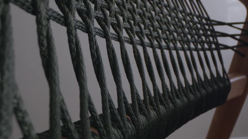 Fabric woven over a wooden frame