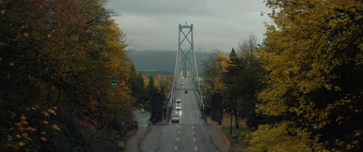 Cars drive over Vancouver's Lions Gate Bridge