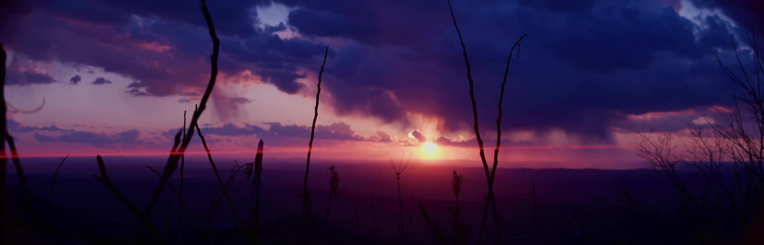 A clip of a dark and red sky