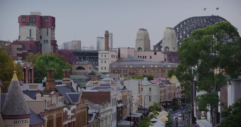 Panorama of an urban city with pedestrian and vehicle traffic with a bridge with the arch in the background