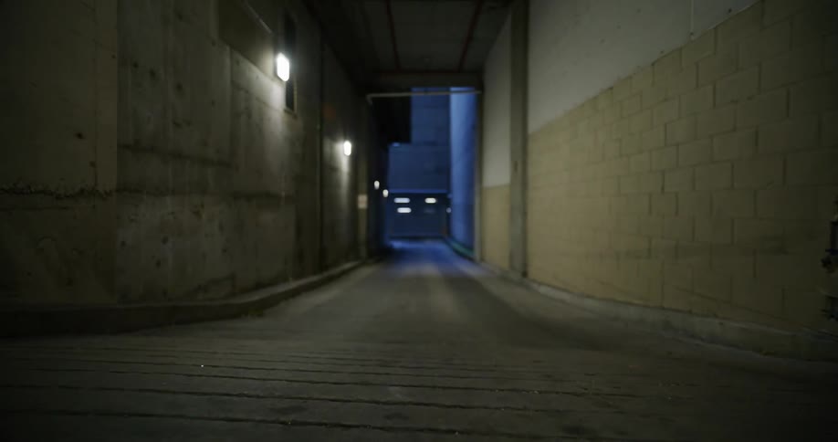 Corridor in a illuminated cement wall