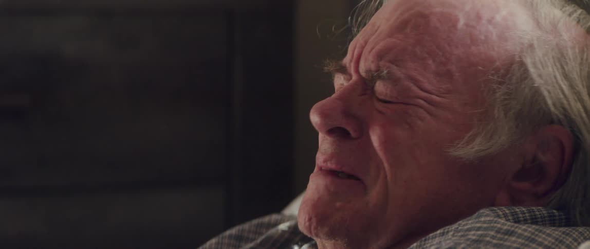 An old man weeps