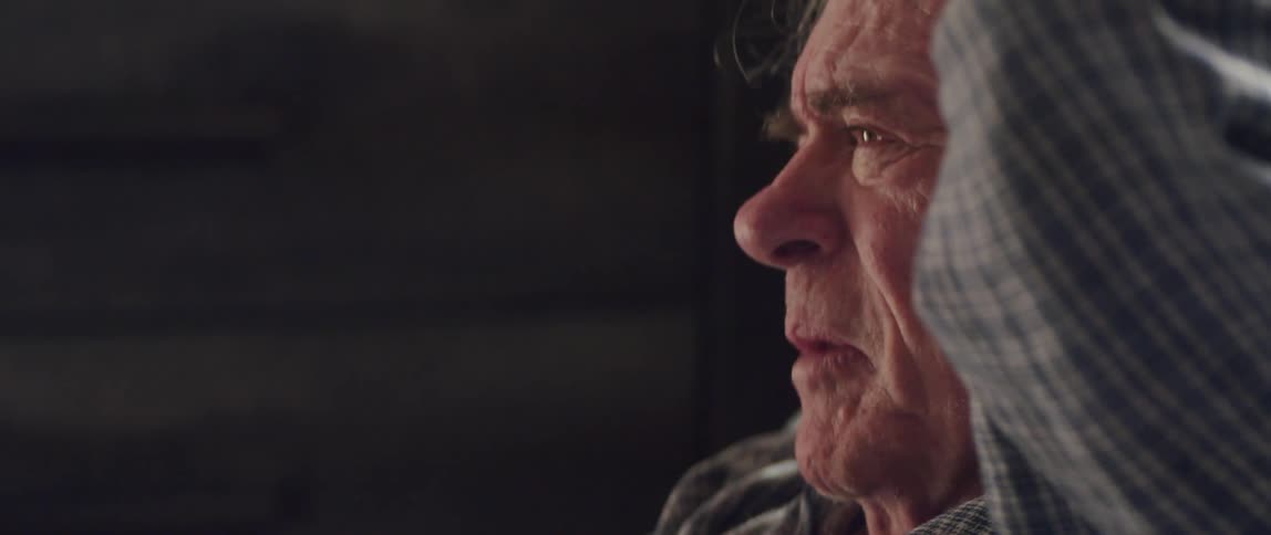A frustrated elderly man expresses sorrow and sadness