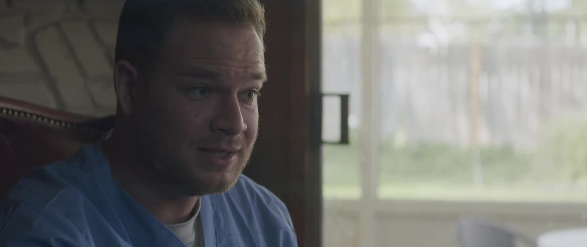 Portrait of a doctor talking indoors