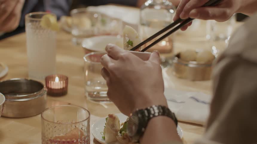People eating a meal together at a restaurant