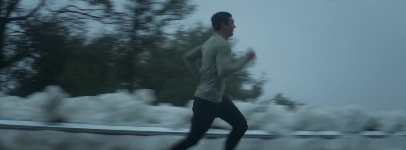 A man is running down the road
