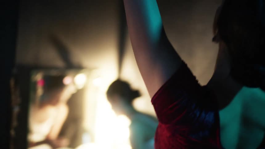 A ballerina practices her dance routine