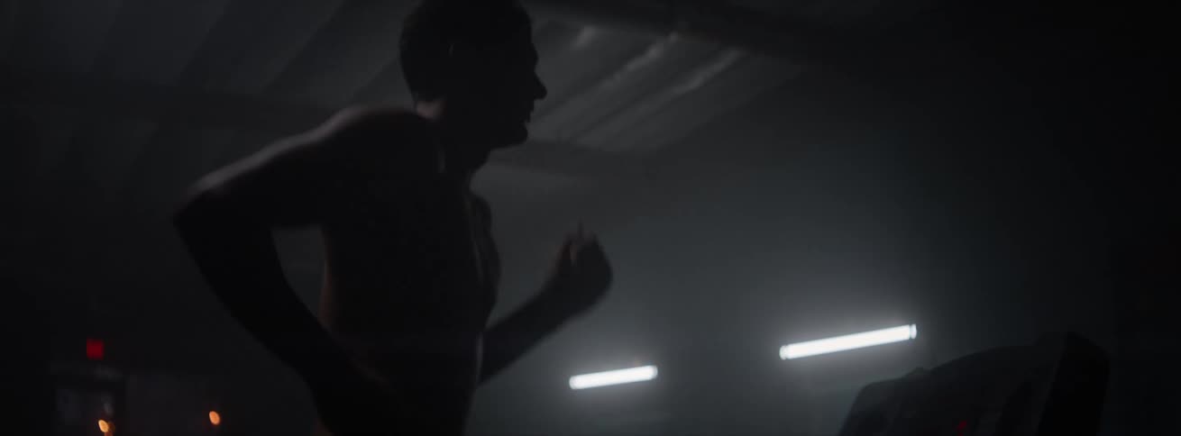 A clip of a man in the gym doing some cardio exercise