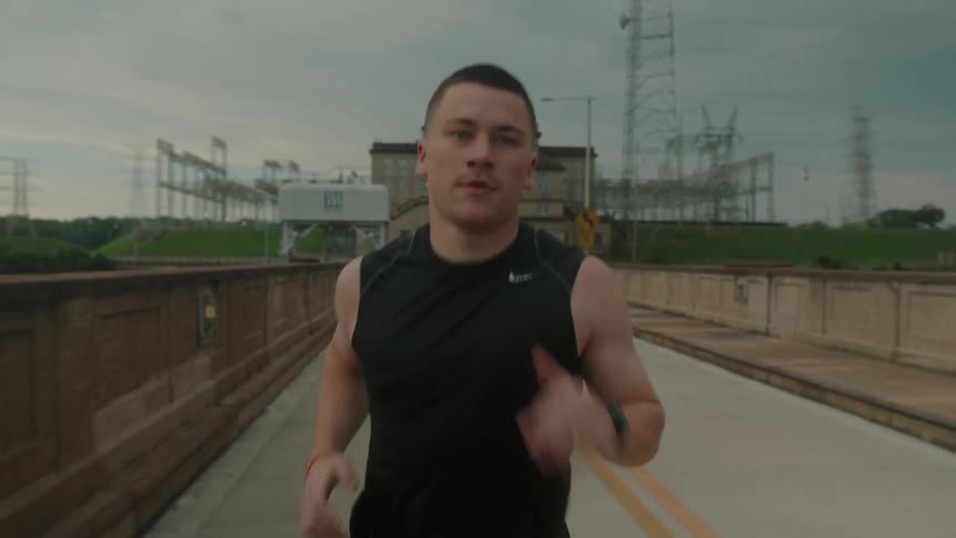 A clip of a man running on the road