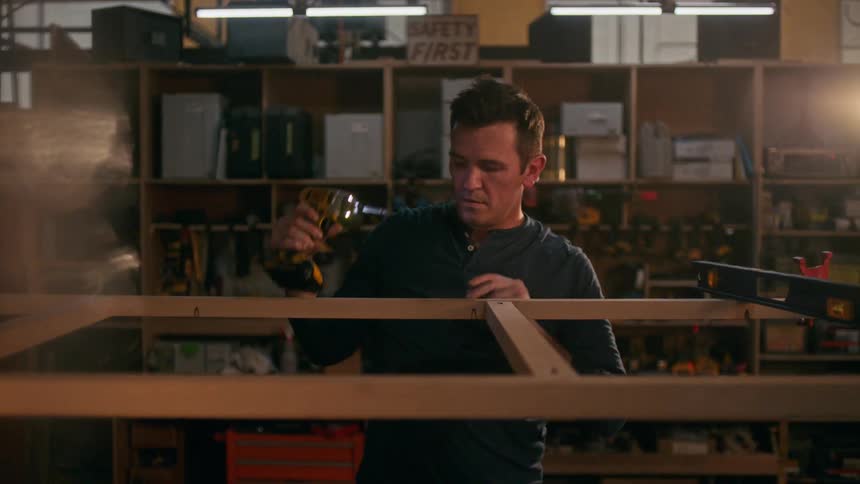 A clip of a man doing some wood work
