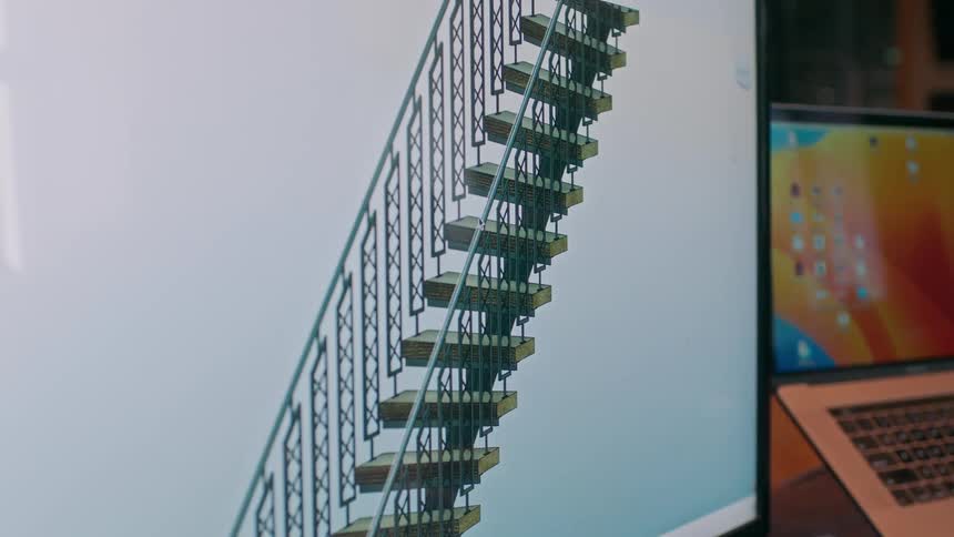 A design of a staircase is on the monitor