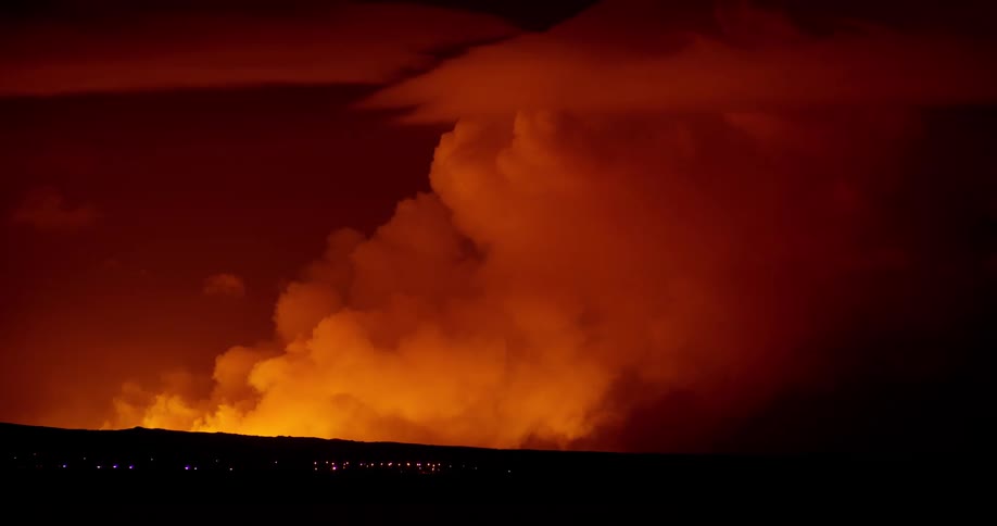 Volcanic eruption smoke fills the air behind Reykjavik city