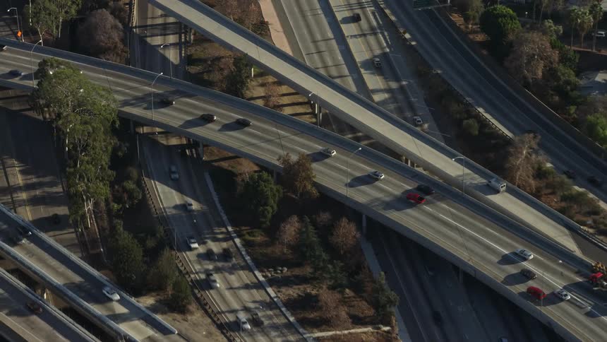 Traffic runs on the freeway on the overpass and roads