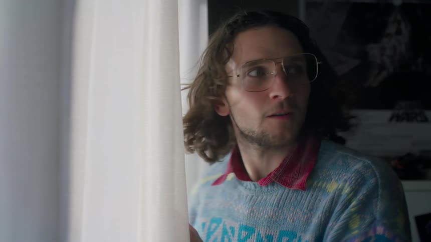 Man looking in the window and being happy and surprised