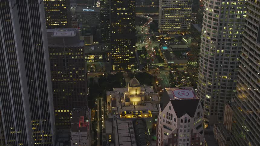 Heavy traffic runs through the city at night