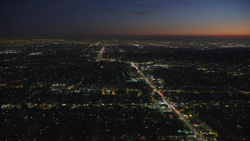 Traffic is lighting up the roads in the city at night