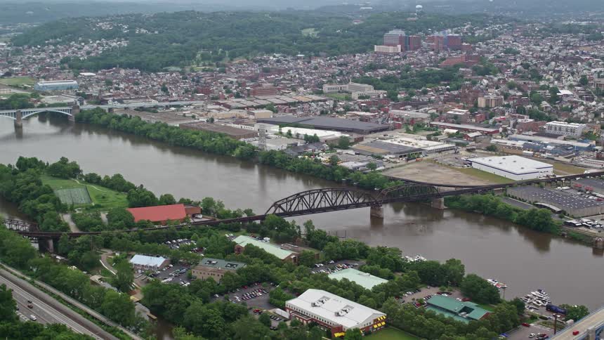 Aerial panorama of a river channel connecting urban cities